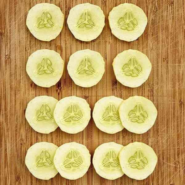 cucumber-jefferson-seeds-1 (1) a sliced cucumber jefferson on a wooden board